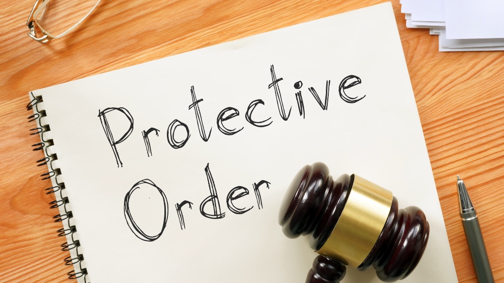 protective order sign with gavel